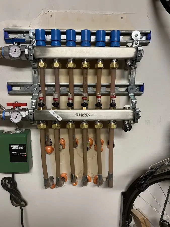 Plumber performing Gas Leak Detection at a residential property in Smithtown